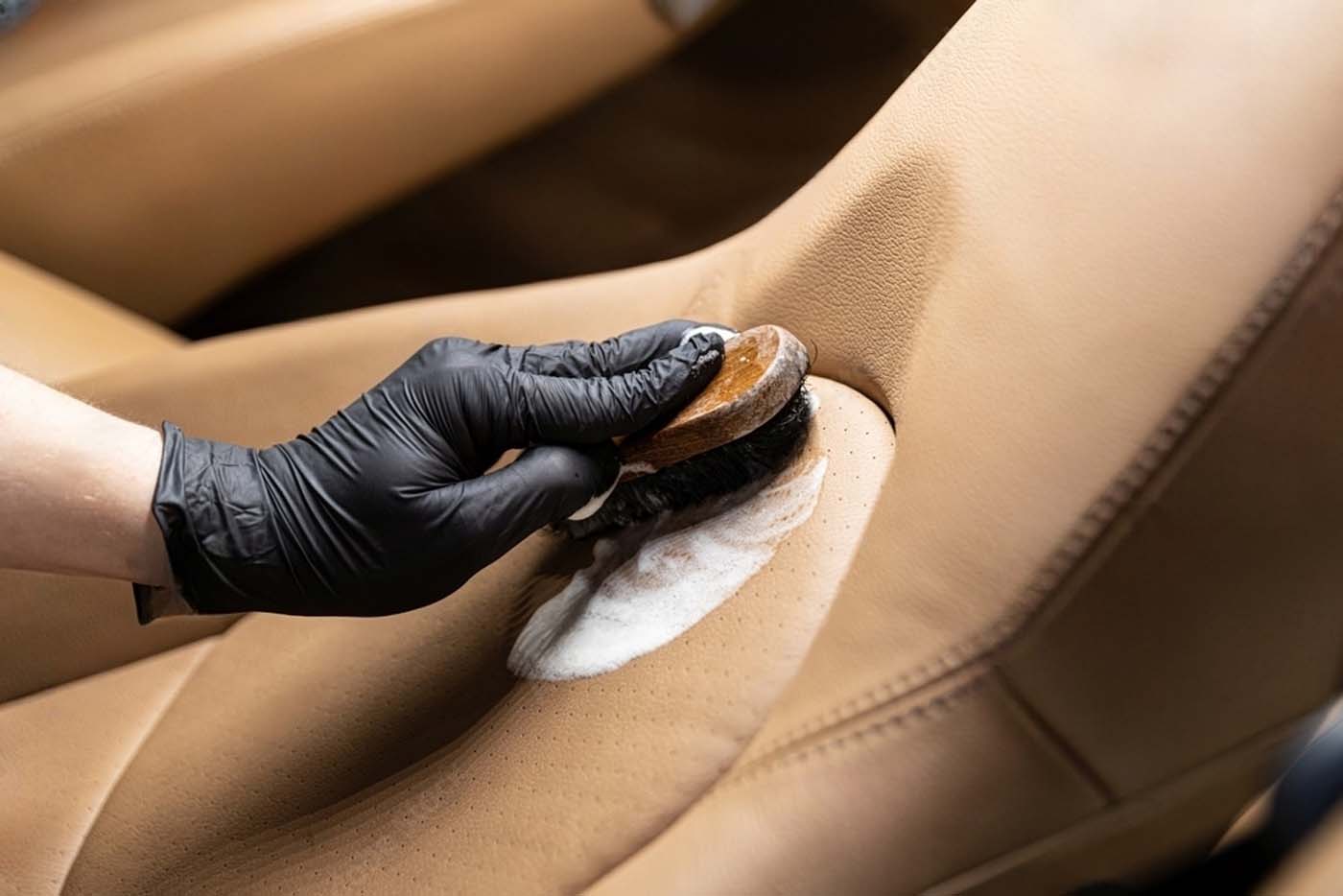 Cleaning leather seats using gently brush